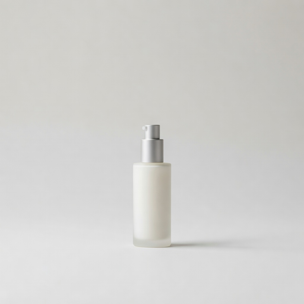 Minimal studio photo of skincare product on gray background
